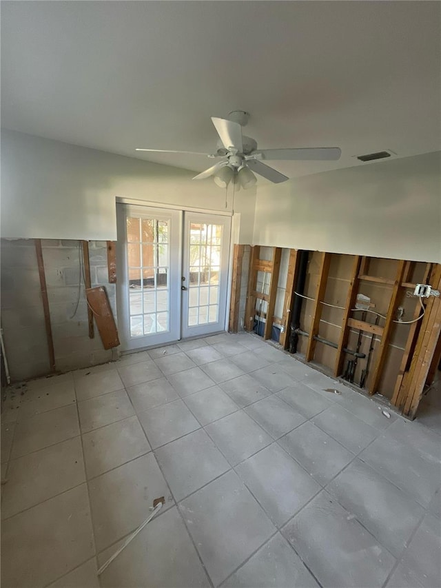 1782 Michigan Ave NE, Saint Petersburg, FL 33703 - empty room featuring ceiling fan, french doors, and tile patterned floors