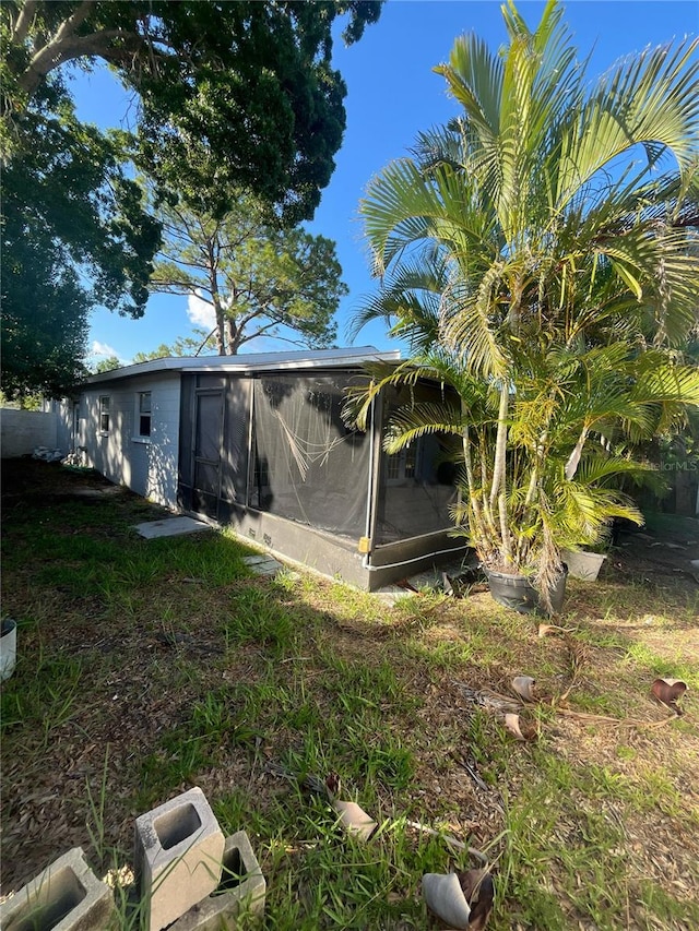 1782 Michigan Ave NE, Saint Petersburg, FL 33703 - view of yard with a sunroom