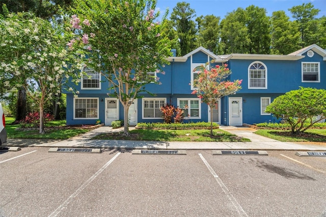 3323 Fox Hunt Dr, Palm Harbor, FL 34683 - multi unit property with uncovered parking and stucco siding