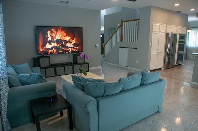 25435 Bruford Blvd, Land O Lakes, FL 34639 - living area with recessed lighting and light tile patterned floors