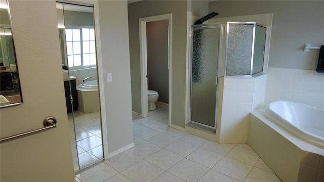 25435 Bruford Blvd, Land O Lakes, FL 34639 - full bath with tile patterned flooring, a shower stall, a bath, and vanity