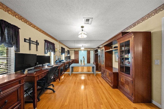 1310 Rustlewood Dr, Brandon, FL 33510 - office with light wood-type flooring and a textured ceiling