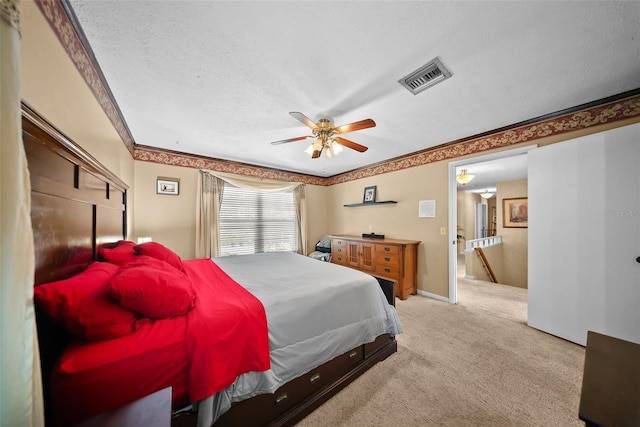 1310 Rustlewood Dr, Brandon, FL 33510 - carpeted bedroom with a ceiling fan and a textured ceiling