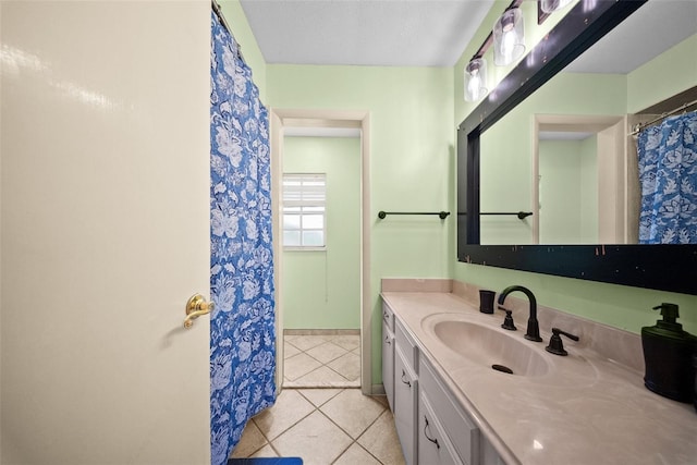 1310 Rustlewood Dr, Brandon, FL 33510 - bathroom featuring vanity, tile patterned floors, and curtained shower