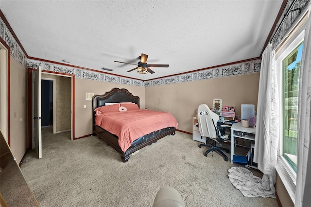 1310 Rustlewood Dr, Brandon, FL 33510 - bedroom featuring a textured ceiling, carpet flooring, ceiling fan, a desk, and ornamental molding