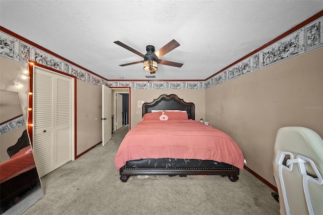 1310 Rustlewood Dr, Brandon, FL 33510 - bedroom featuring crown molding, carpet floors, ceiling fan, a textured ceiling, and a closet