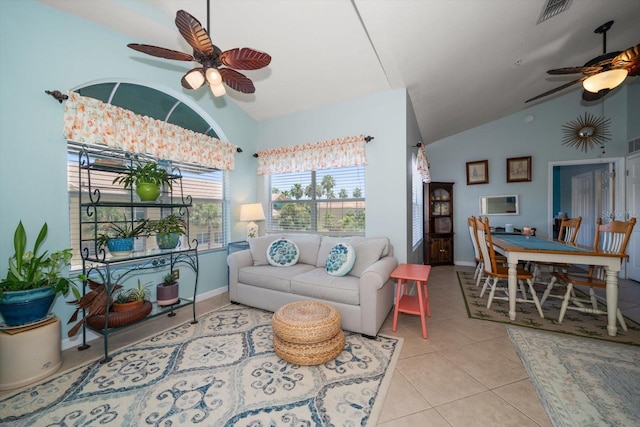 10764 70th Ave Unit 4305, Seminole, FL 33772 - living room featuring lofted ceiling, ceiling fan, and light tile patterned flooring