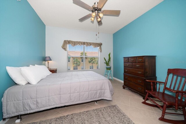 10764 70th Ave Unit 4305, Seminole, FL 33772 - tiled bedroom featuring ceiling fan and baseboards