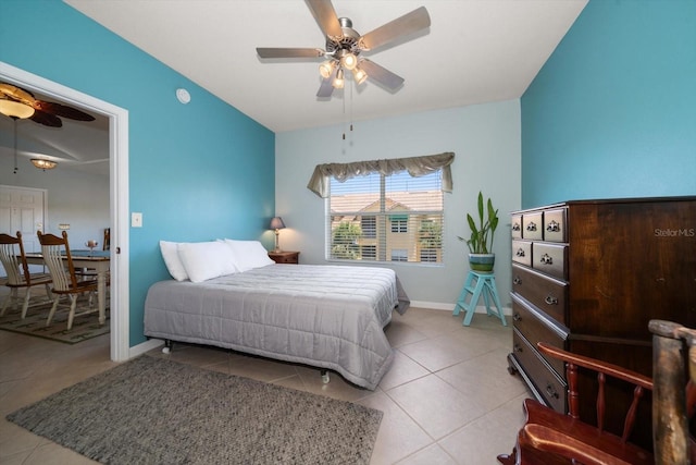 10764 70th Ave Unit 4305, Seminole, FL 33772 - tiled bedroom with baseboards and a ceiling fan