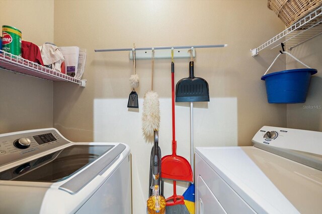 10764 70th Ave Unit 4305, Seminole, FL 33772 - washroom with washing machine and clothes dryer