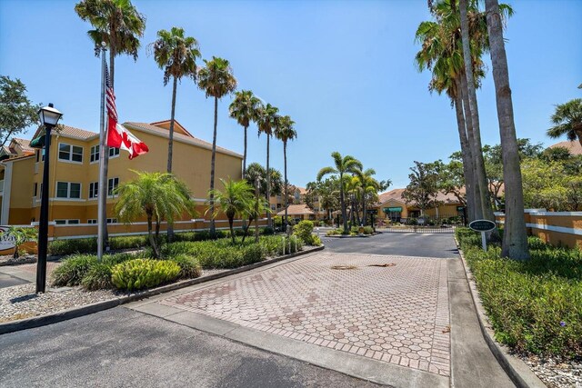 10764 70th Ave Unit 4305, Seminole, FL 33772 - view of street featuring curbs and a residential view