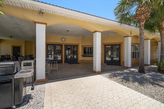 10764 70th Ave Unit 4305, Seminole, FL 33772 - view of patio with french doors