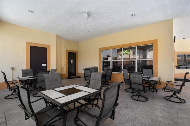 10764 70th Ave Unit 4305, Seminole, FL 33772 - view of patio / terrace featuring outdoor dining area