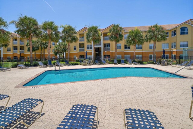 10764 70th Ave Unit 4305, Seminole, FL 33772 - community pool featuring a patio area