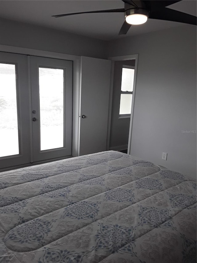 702 Cypress Pl, Sun City Center, FL 33573 - bedroom featuring french doors and ceiling fan
