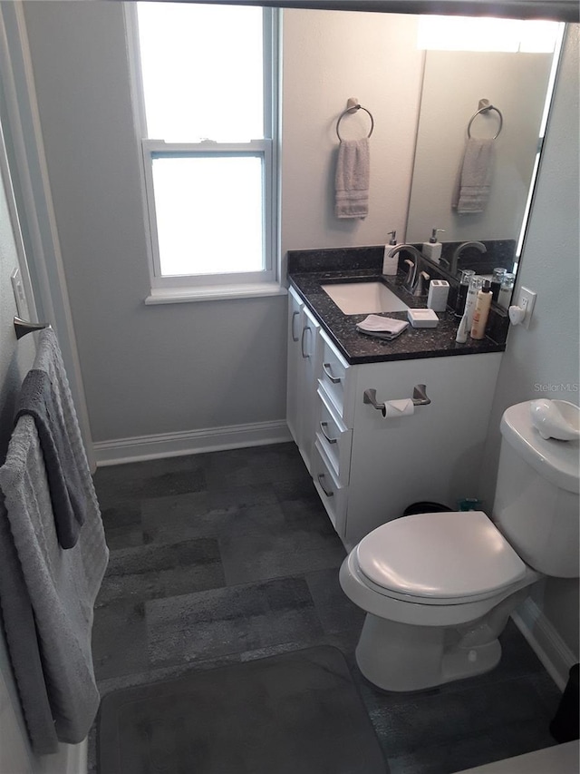 702 Cypress Pl, Sun City Center, FL 33573 - bathroom with vanity and toilet