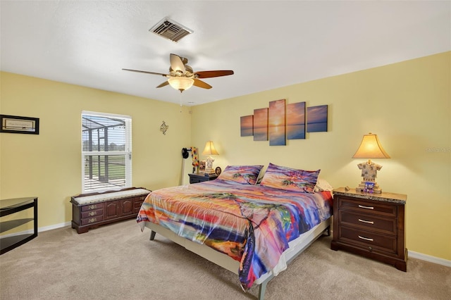 125 Paddock St, Lehigh Acres, FL 33974 - bedroom with light colored carpet and a ceiling fan