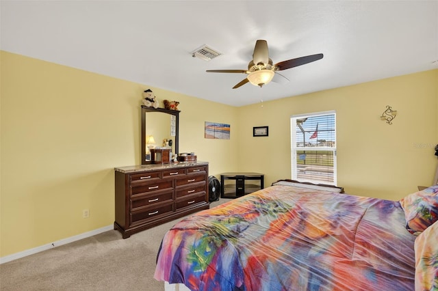 125 Paddock St, Lehigh Acres, FL 33974 - bedroom with light carpet and a ceiling fan