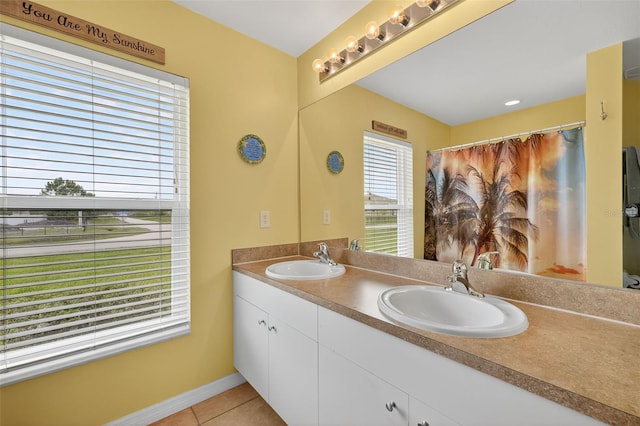 125 Paddock St, Lehigh Acres, FL 33974 - full bathroom featuring double vanity and tile patterned floors