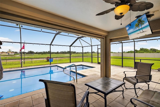 125 Paddock St, Lehigh Acres, FL 33974 - outdoor pool featuring a lanai, a patio area, a yard, and ceiling fan
