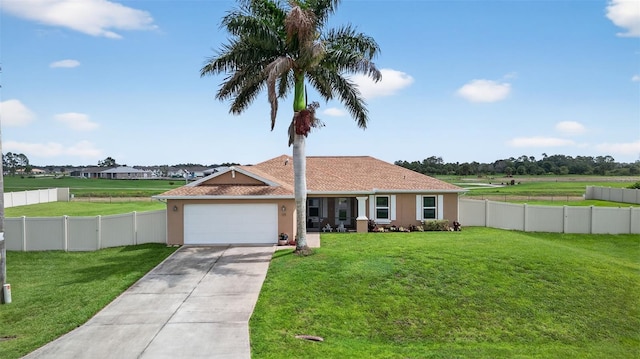 125 Paddock St, Lehigh Acres, FL 33974 - ranch-style house with concrete driveway, a garage, and stucco siding