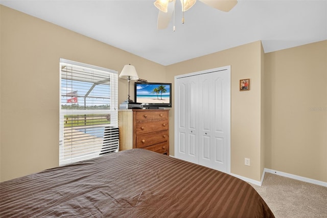 125 Paddock St, Lehigh Acres, FL 33974 - bedroom featuring carpet, a closet, and ceiling fan