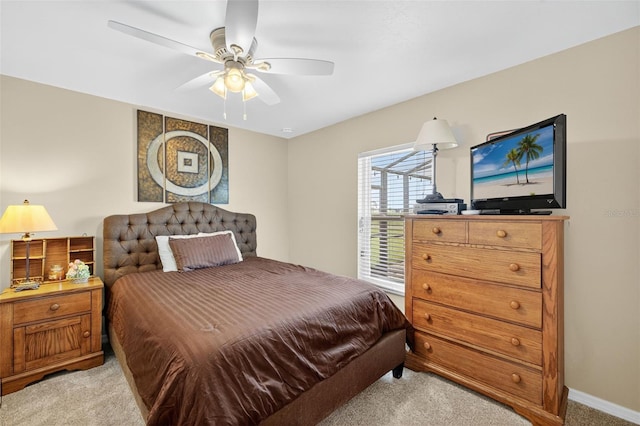 125 Paddock St, Lehigh Acres, FL 33974 - bedroom featuring light carpet and ceiling fan