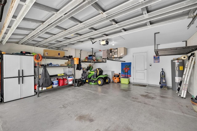 125 Paddock St, Lehigh Acres, FL 33974 - garage featuring electric water heater and a garage door opener