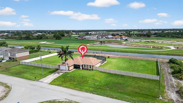 125 Paddock St, Lehigh Acres, FL 33974 - aerial view of residential area featuring a nearby body of water and a golf course