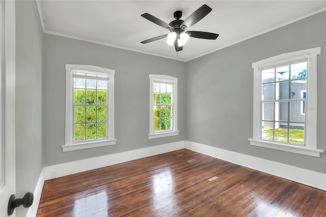 720 Woodward St, Lakeland, FL 33803 - unfurnished room featuring healthy amount of natural light, hardwood / wood-style floors, ornamental molding, and ceiling fan