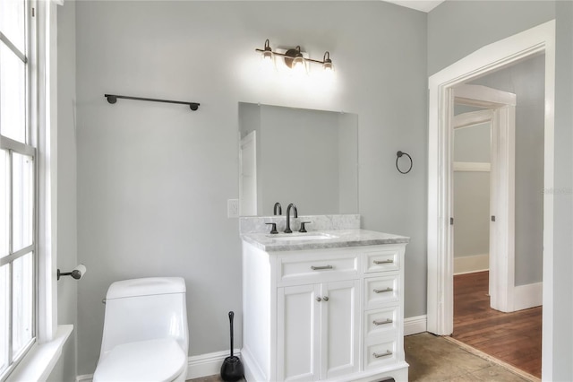 720 Woodward St, Lakeland, FL 33803 - bathroom featuring vanity and toilet