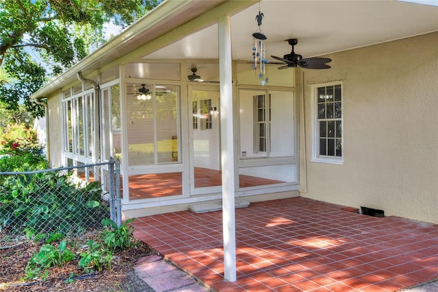 720 Woodward St, Lakeland, FL 33803 - view of patio / terrace featuring ceiling fan and a sunroom