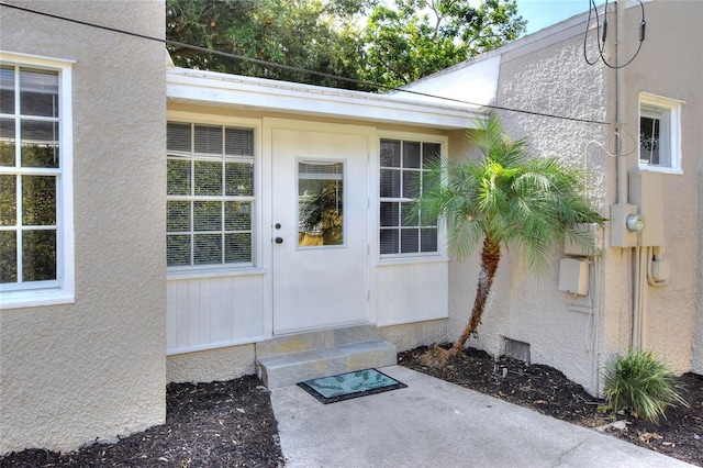 720 Woodward St, Lakeland, FL 33803 - property entrance with stucco siding