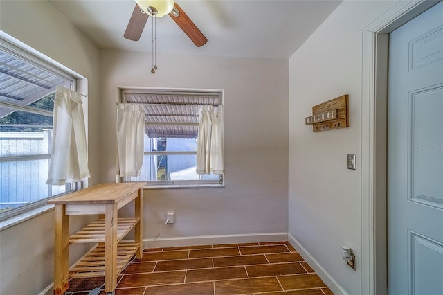 2123 Indigo Dr, Clearwater, FL 33763 - interior space featuring healthy amount of natural light, ceiling fan, and wood tiled floors