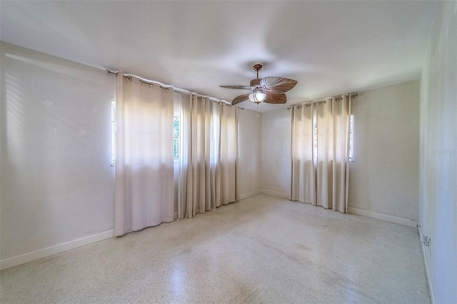 2123 Indigo Dr, Clearwater, FL 33763 - spare room with a ceiling fan and baseboards