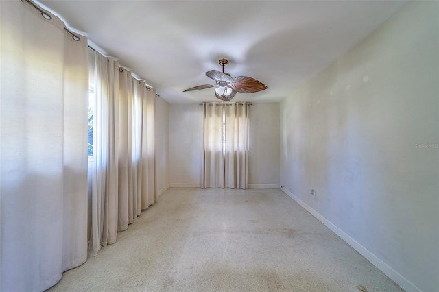 2123 Indigo Dr, Clearwater, FL 33763 - unfurnished room featuring ceiling fan and baseboards