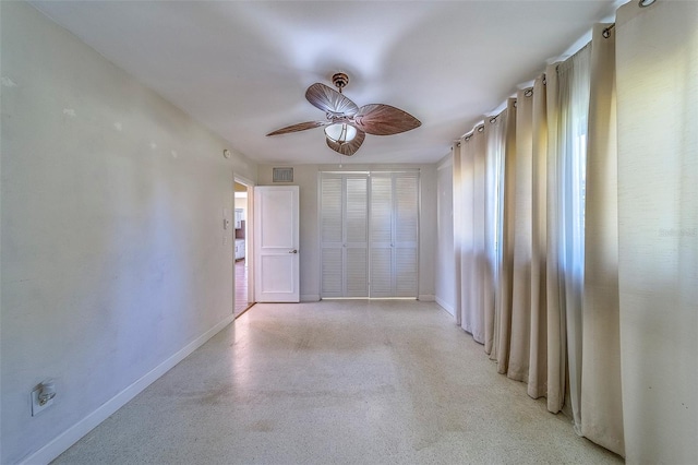 2123 Indigo Dr, Clearwater, FL 33763 - empty room featuring a ceiling fan and baseboards