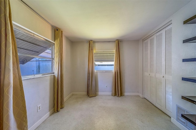 2123 Indigo Dr, Clearwater, FL 33763 - unfurnished bedroom with carpet and a closet