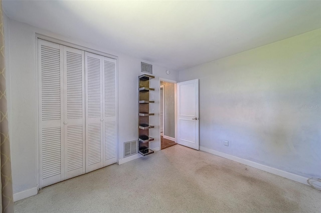2123 Indigo Dr, Clearwater, FL 33763 - unfurnished bedroom with baseboards and a closet