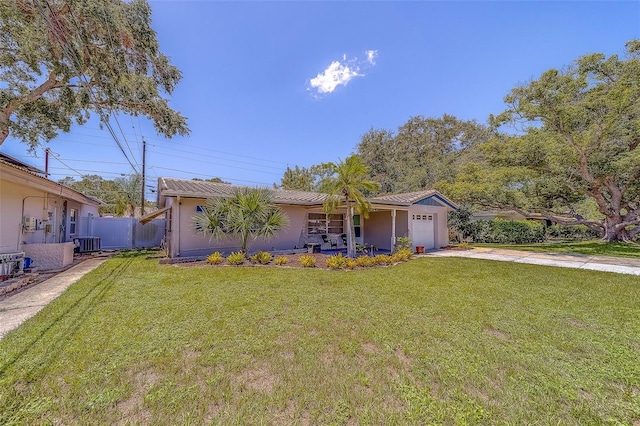 2123 Indigo Dr, Clearwater, FL 33763 - single story home featuring driveway, a porch, an attached garage, and stucco siding