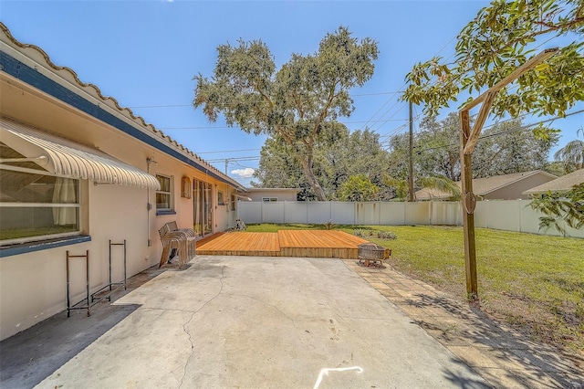 2123 Indigo Dr, Clearwater, FL 33763 - fenced backyard featuring a deck and a patio area