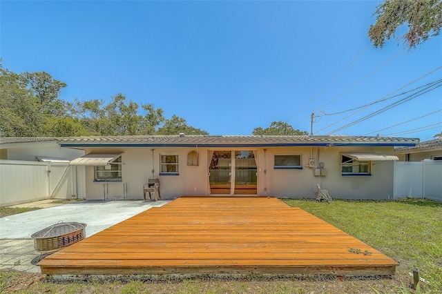2123 Indigo Dr, Clearwater, FL 33763 - back of property with a deck and stucco siding