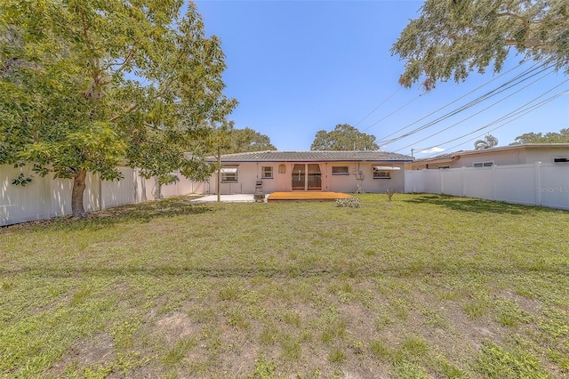 2123 Indigo Dr, Clearwater, FL 33763 - back of property featuring a fenced backyard and a patio