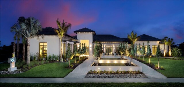 640 Allora Ave, Nokomis, FL 34275 - mediterranean / spanish-style home featuring a front yard and stucco siding