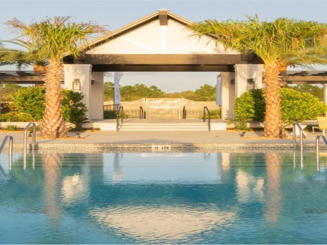 6057 Marsh Trail Dr, Odessa, FL 33556 - swimming pool featuring a gazebo and a water view