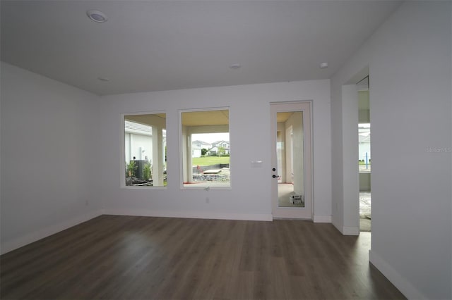 699 Allora Ave, Nokomis, FL 34275 - unfurnished room featuring dark wood finished floors and baseboards