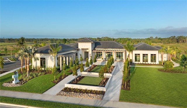699 Allora Ave, Nokomis, FL 34275 - view of front of home with a front yard, stucco siding, and a pergola