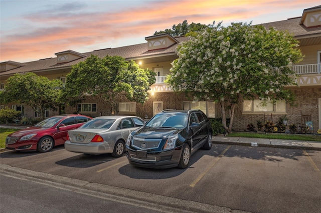 2192 Swedish Dr Unit 26, Clearwater, FL 33763 - view of front of property featuring uncovered parking and brick siding