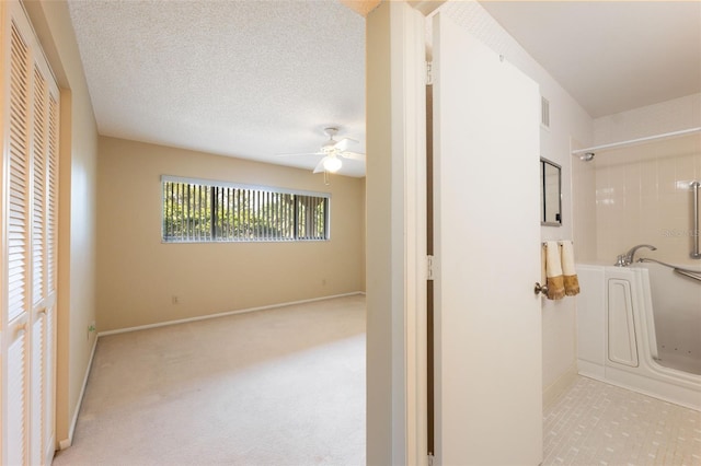 2192 Swedish Dr Unit 26, Clearwater, FL 33763 - bathroom with ceiling fan and baseboards