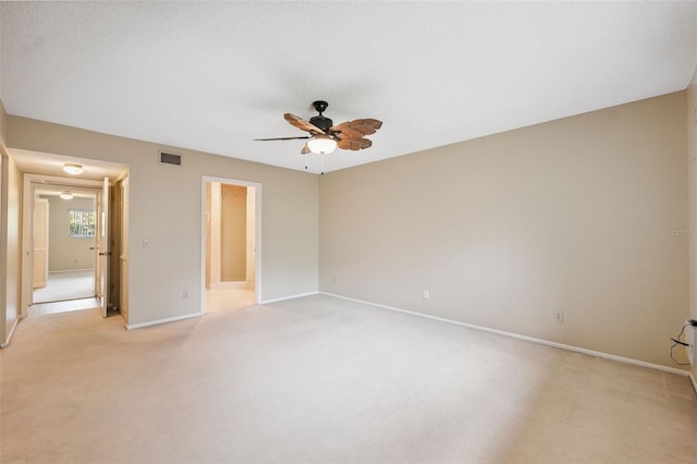 2192 Swedish Dr Unit 26, Clearwater, FL 33763 - unfurnished bedroom with light carpet and ceiling fan